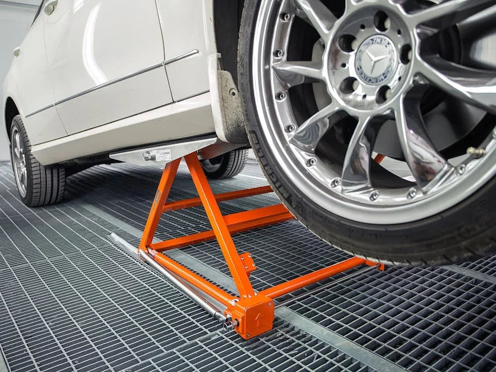 Say goodbye to crawling under the car on a bracket or sitting precariously on a lever!